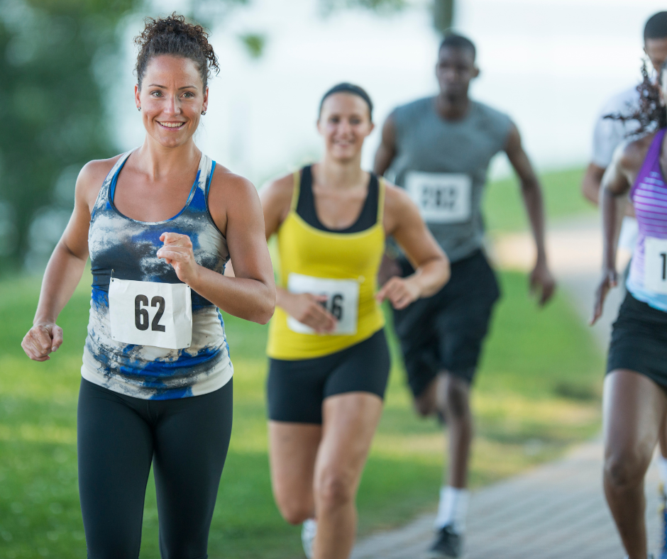 a group of people running in a marathon